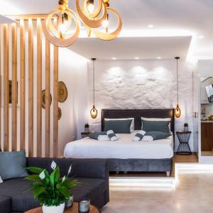 A bed or beds in a room at Sofilins Luxury Suite
