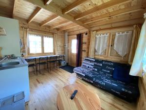 Posezení v ubytování Chalet des coteaux + 2 fotografie