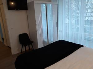 Posteľ alebo postele v izbe v ubytovaní Bel appartement centre Rouen avec terrasse