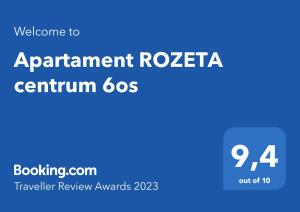 En logo, et sertifikat eller et firmaskilt på Apartament ROZETA centrum 6os