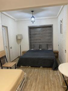 Postel nebo postele na pokoji v ubytování Mini Hostel N.Tigranyan 5