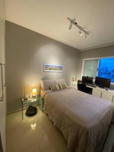 Ένα ή περισσότερα κρεβάτια σε δωμάτιο στο Excepcional apartamento 3/4