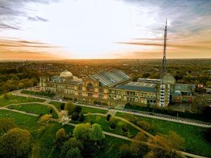 an aerial view of a large building in a city at Entire apartment L B Haringey, Alexandra palace in London