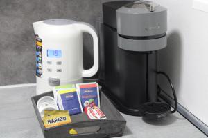 Facilități de preparat ceai și cafea la Schickes Appartement an der Neckarpromenade