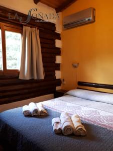 Postel nebo postele na pokoji v ubytování La Soñada Cabañas & Spa + 63 fotografií