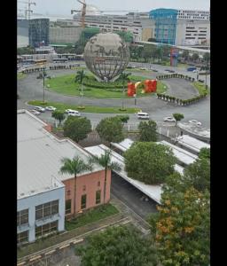 a view of a city street with a large ball at Yhanz Z Sea Residences in Manila