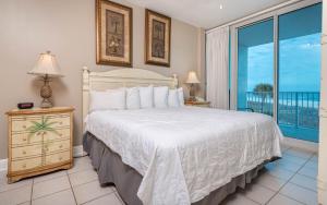 Ένα ή περισσότερα κρεβάτια σε δωμάτιο στο Lighthouse 216 condo