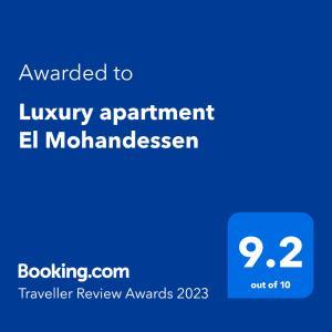 Un certificat, premiu, logo sau alt document afișat la Luxury apartment El Mohandessen