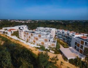 an aerial view of an apartment complex at The Waves Tulum in Tulum