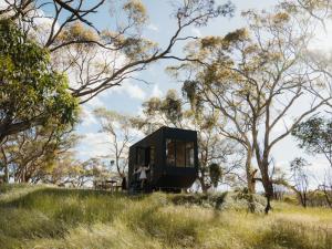 a house sitting on top of a hill in a field at CABN Clare Valley in Mintaro