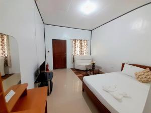 Postel nebo postele na pokoji v ubytování TheSoftbed Homestay