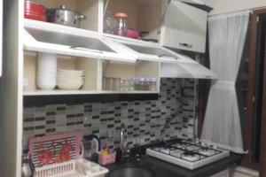 A cozinha ou kitchenette de New Family Apartment