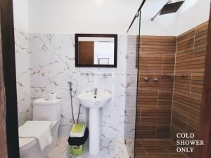 Koupelna v ubytování Meili Beach Resort + 20 fotografií