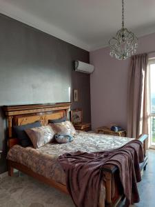 Tempat tidur dalam kamar di Bed and Breakfast La Pecora Rosa