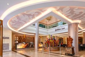 a lobby of a shopping mall with a lot of umbrellas at Golden Sea Hua Hin - SHA Extra Plus in Hua Hin +138 photos
