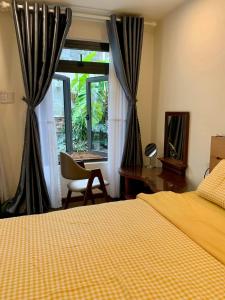 Postel nebo postele na pokoji v ubytování T&K Guesthouse