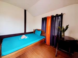 Postel nebo postele na pokoji v ubytování TheSoftbed Homestay