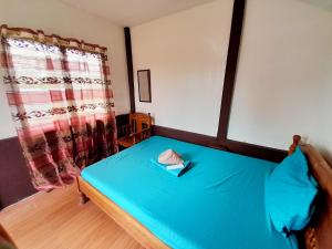 Postel nebo postele na pokoji v ubytování TheSoftbed Homestay