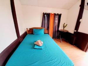 Postel nebo postele na pokoji v ubytování TheSoftbed Homestay