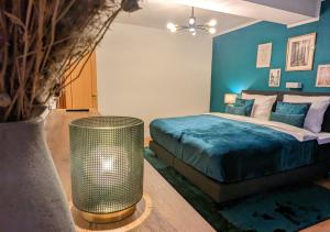 Postel nebo postele na pokoji v ubytování FeWo Goldstück mit privatem SPA und Whirlpool