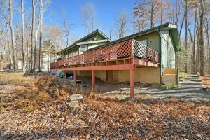 a house with a large balcony on the side of it at Pocono Pines, Lake Naomi 4 bedrooms, 2 full bath in Pocono Pines