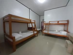 Postel nebo postele na pokoji v ubytování TheSoftbed Homestay