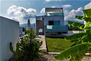 Fotografia z galérie ubytovania Xenos Villa 4 - Luxury Villa With Private Swimming Pool Near The Sea v destinácii Tigaki