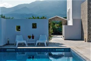 Fotografia z galérie ubytovania Xenos Villa 4 - Luxury Villa With Private Swimming Pool Near The Sea v destinácii Tigaki