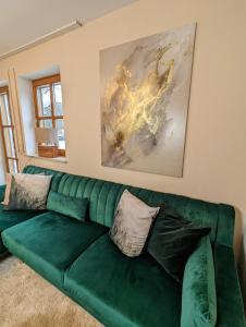 Posezení v ubytování FeWo Goldstück mit privatem SPA und Whirlpool
