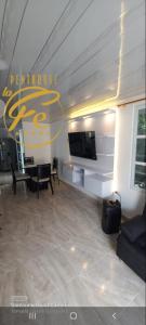 TV a/nebo společenská místnost v ubytování Penthouses La Fe