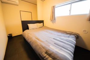 Uma cama ou camas num quarto em ACT one