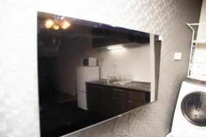 A cozinha ou kitchenette de ACT one