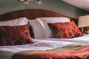 Voodi või voodid majutusasutuse Mojo Hotell toas