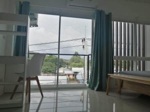 Postel nebo postele na pokoji v ubytování Baan7984 Rawai