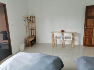 Postel nebo postele na pokoji v ubytování Baan7984 Rawai