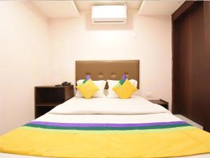 Hotel Soneva Inn客房内的一张或多张床位