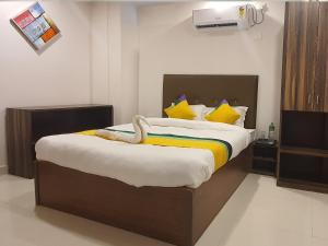 Hotel Soneva Inn客房内的一张或多张床位
