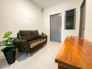 Venice Guest Hostel - Bilik Sahaja的休息区