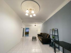 Venice Guest Hostel - Bilik Sahaja的休息区