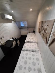 Postel nebo postele na pokoji v ubytování Hotel Boršičanka