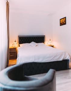 Säng eller sängar i ett rum på Motel Piatra Corbului