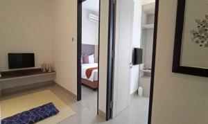 Televisi dan/atau pusat hiburan di Sparks Odeon Sukabumi, ARTOTEL Curated