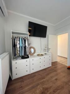 A television and/or entertainment centre at BEST VIEW at the Best Location