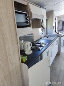 Køkken eller tekøkken på mini-camping 't Bergje