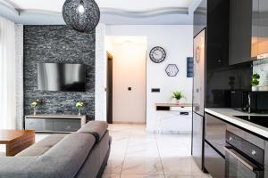 Kuchyň nebo kuchyňský kout v ubytování Sebastian Luxury Apartments