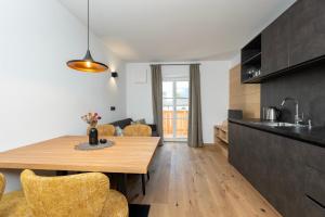 Kuchyň nebo kuchyňský kout v ubytování Residence Kugler
