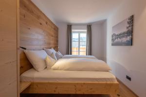 Postel nebo postele na pokoji v ubytování Residence Kugler