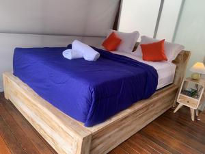 Postel nebo postele na pokoji v ubytování Volcano rim Kintamani