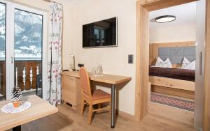 TV o dispositivi per l'intrattenimento presso Seehotel St Hubertus
