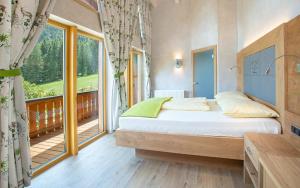 Letto o letti in una camera di Seehotel St Hubertus